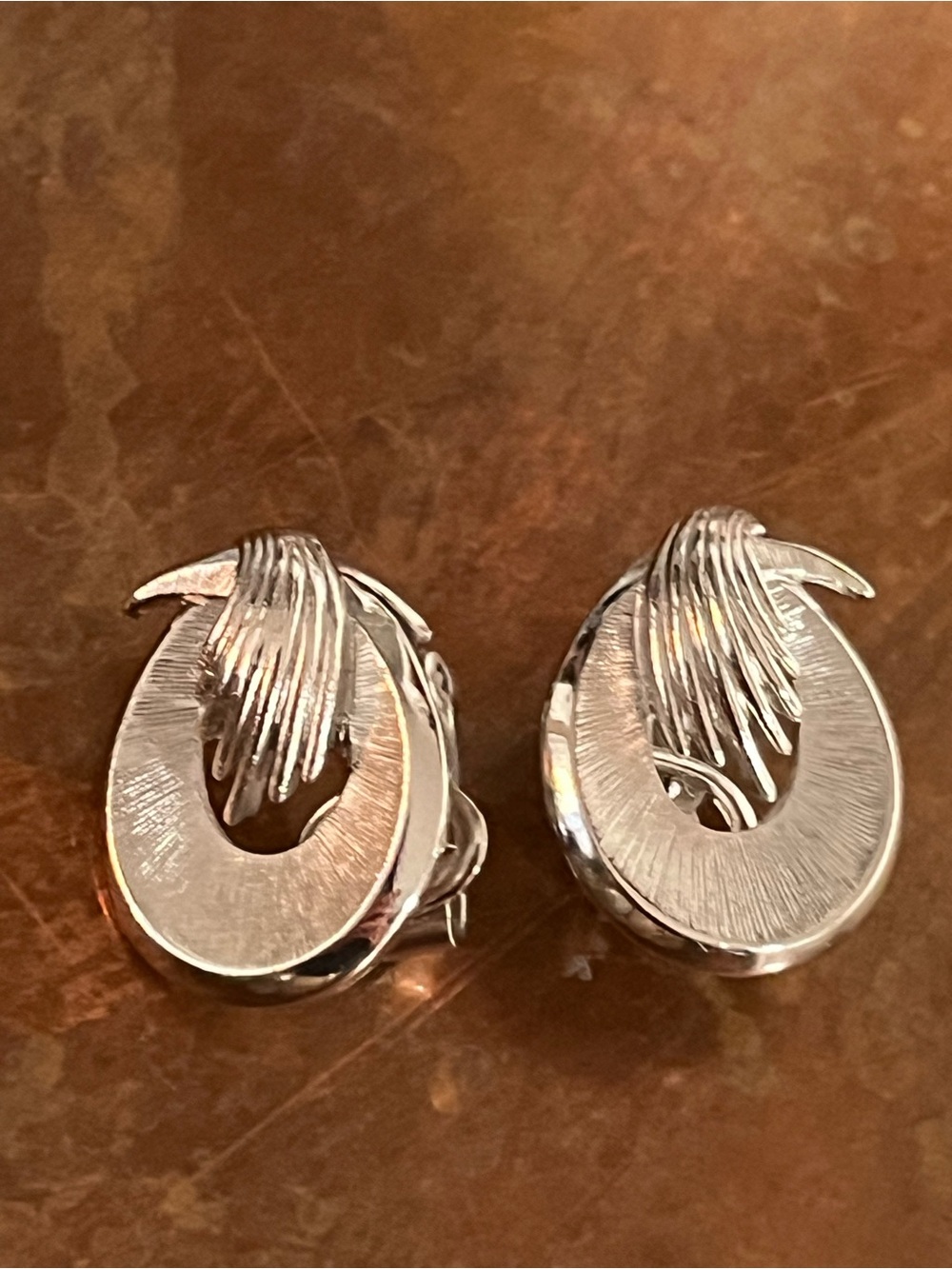Silver Sculpted Clip-On Earrings with Textured Detail